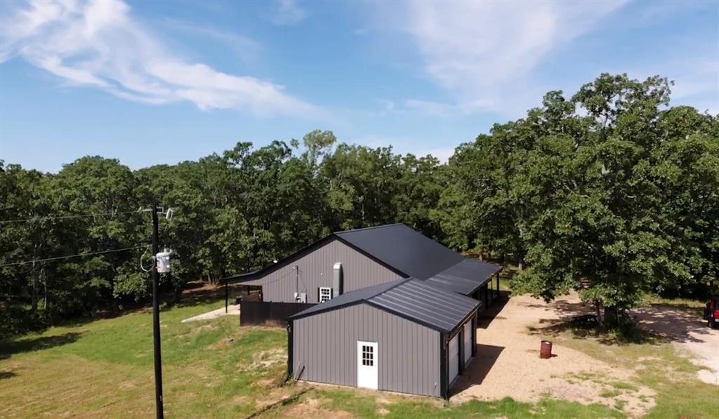 1411 Rains County Road 2610 Alba, TX 75410 - Photo 22 of 25 a aerial view of a house