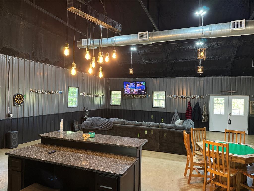 1411 Rains County Road 2610 Alba, TX 75410 - Photo 6 of 25 a kitchen with a table and chairs in it