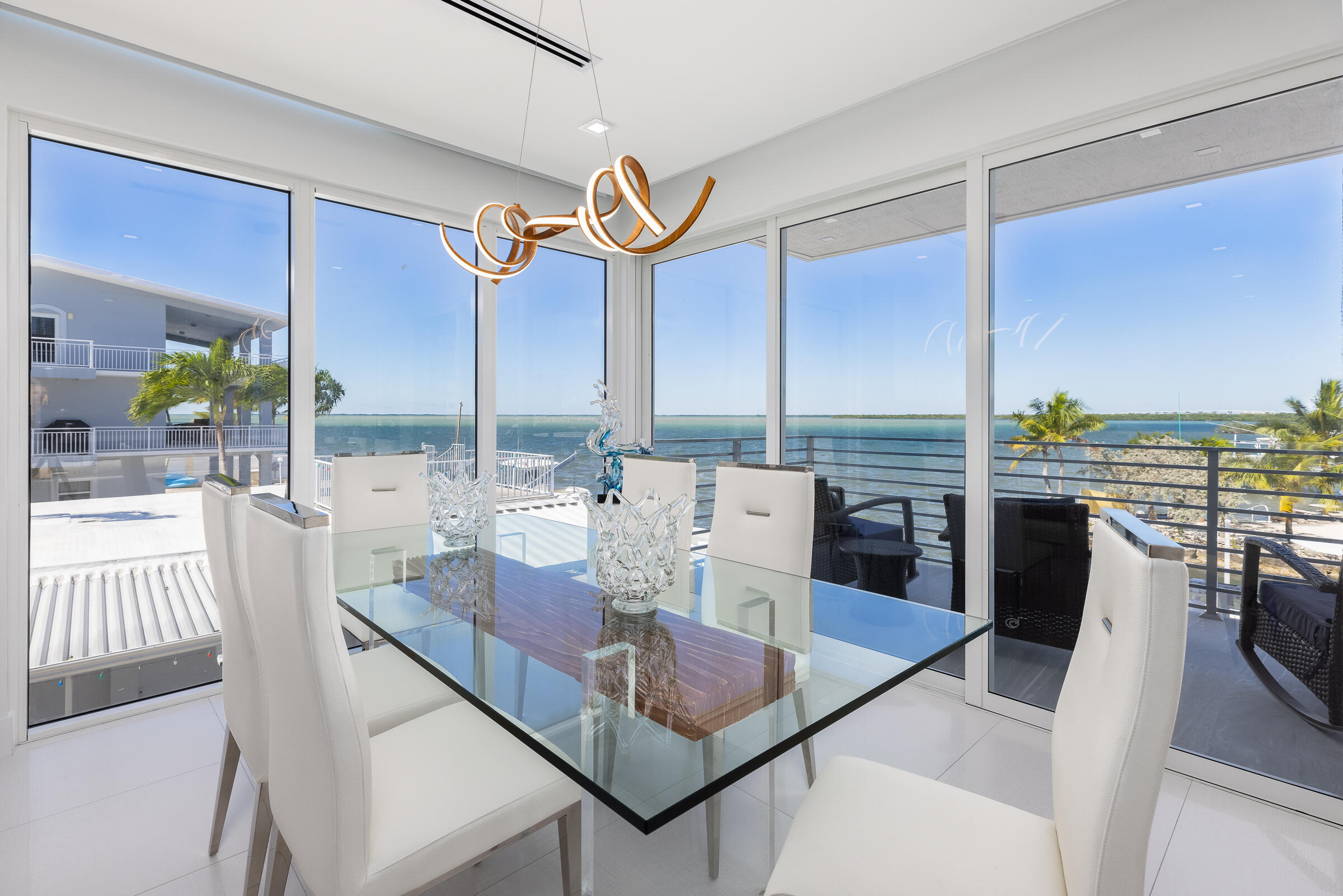45 Cormorant Drive Key Largo, FL 33037 - Photo 14 of 51 a view of a dining room with furniture