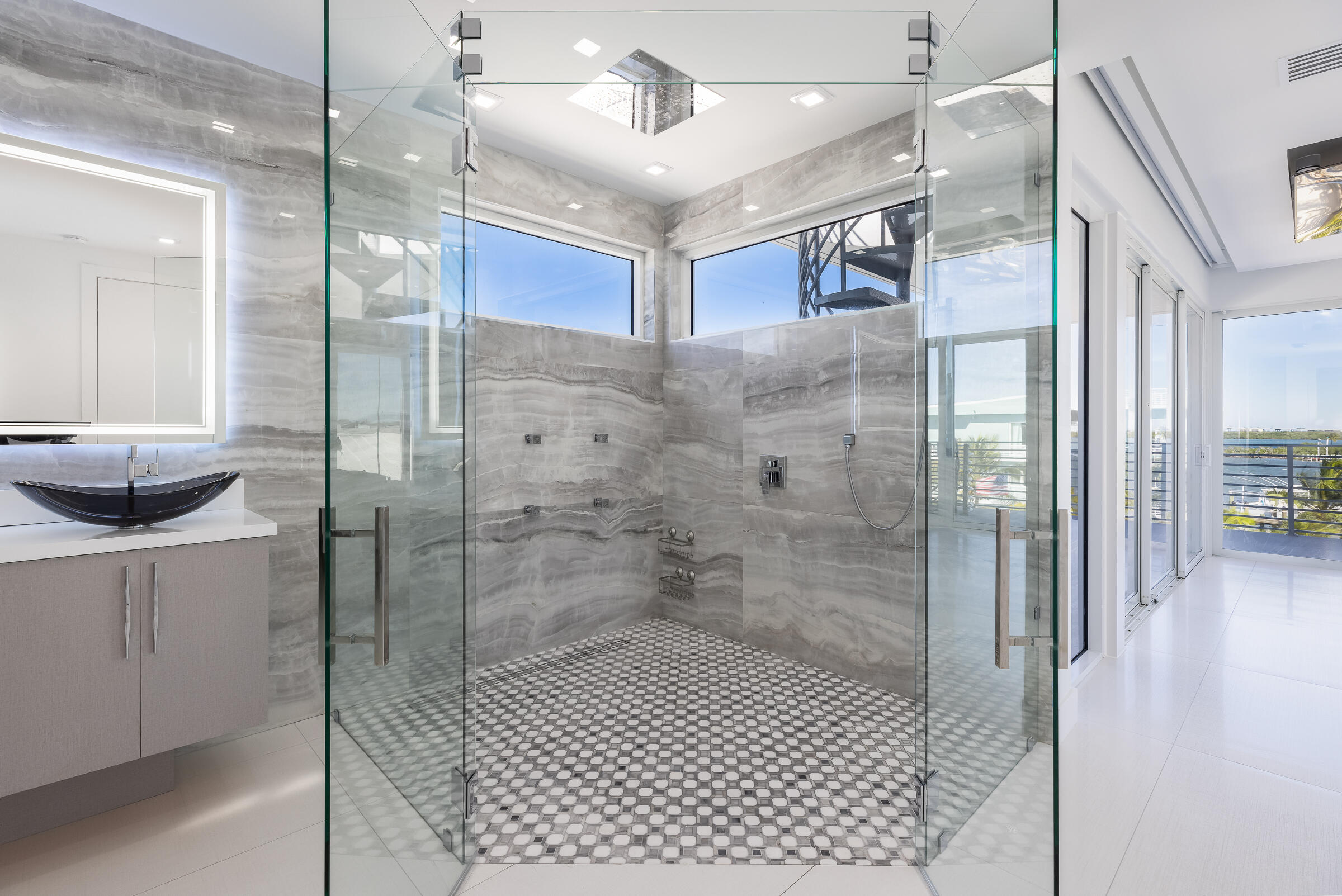 45 Cormorant Drive Key Largo, FL 33037 - Photo 20 of 51 a bathroom with a shower and a sink