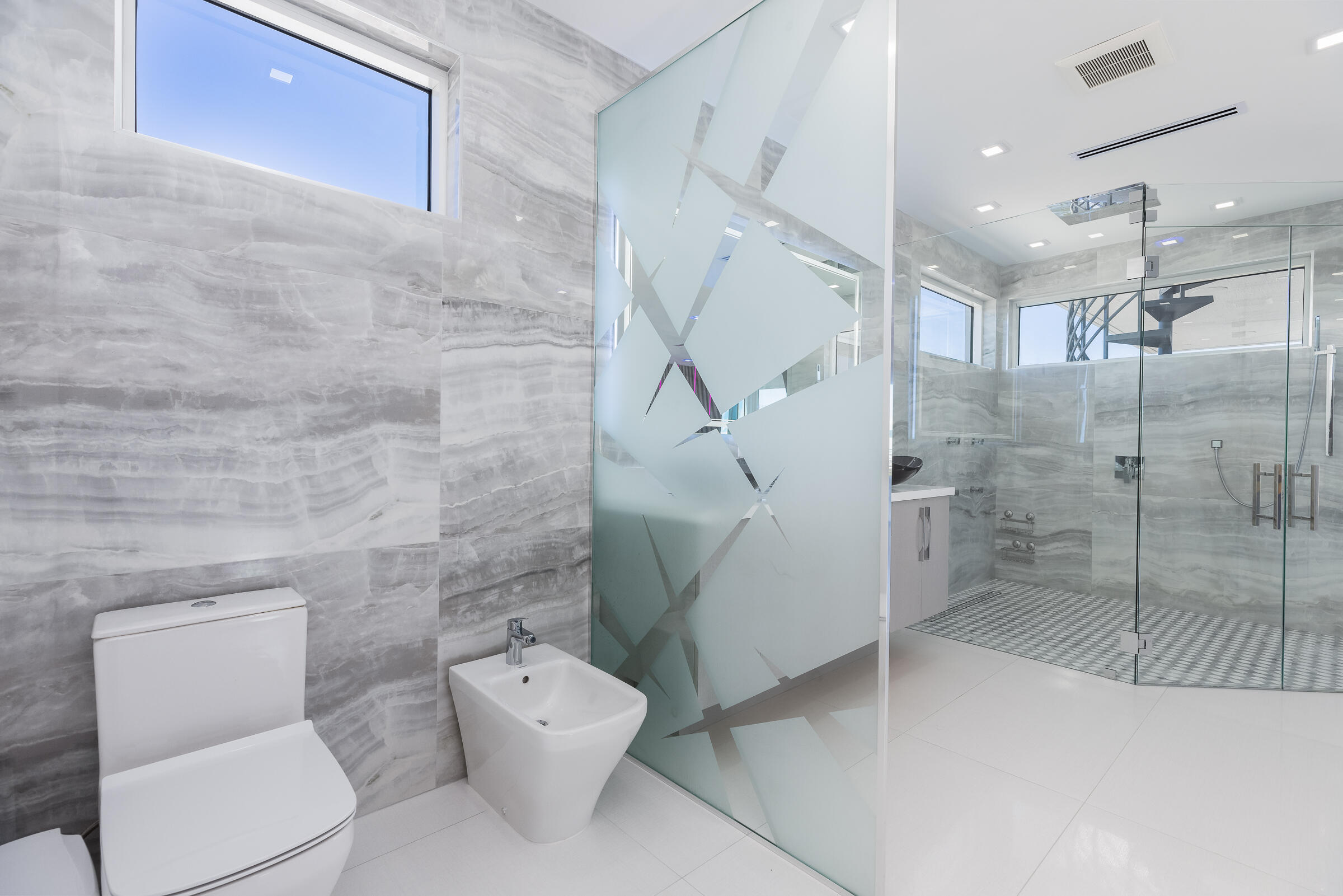 45 Cormorant Drive Key Largo, FL 33037 - Photo 22 of 51 a bathroom with a toilet and a shower