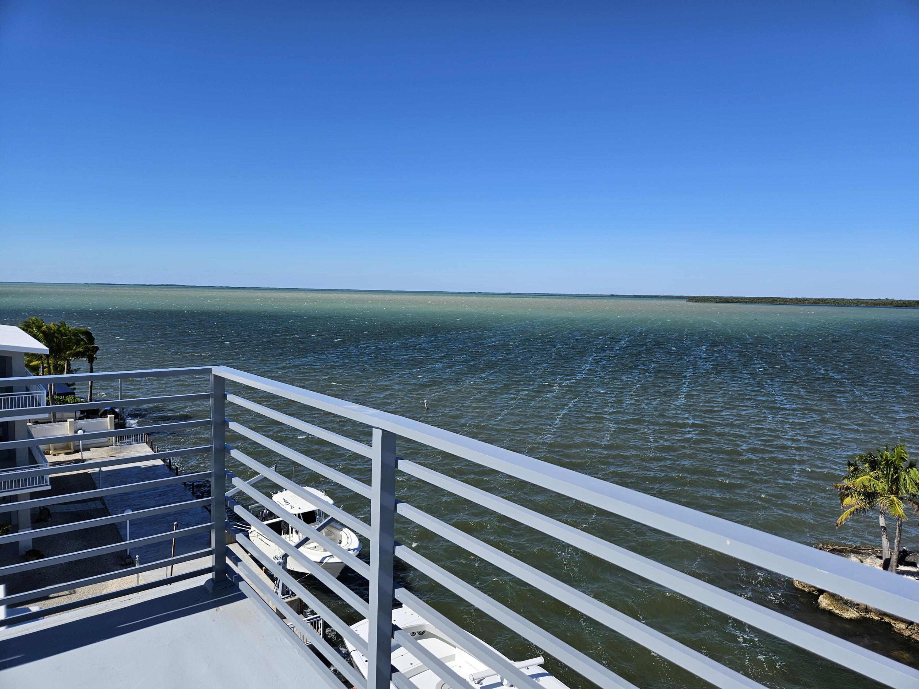 45 Cormorant Drive Key Largo, FL 33037 - Photo 26 of 51 a view of wooden floor with a lake