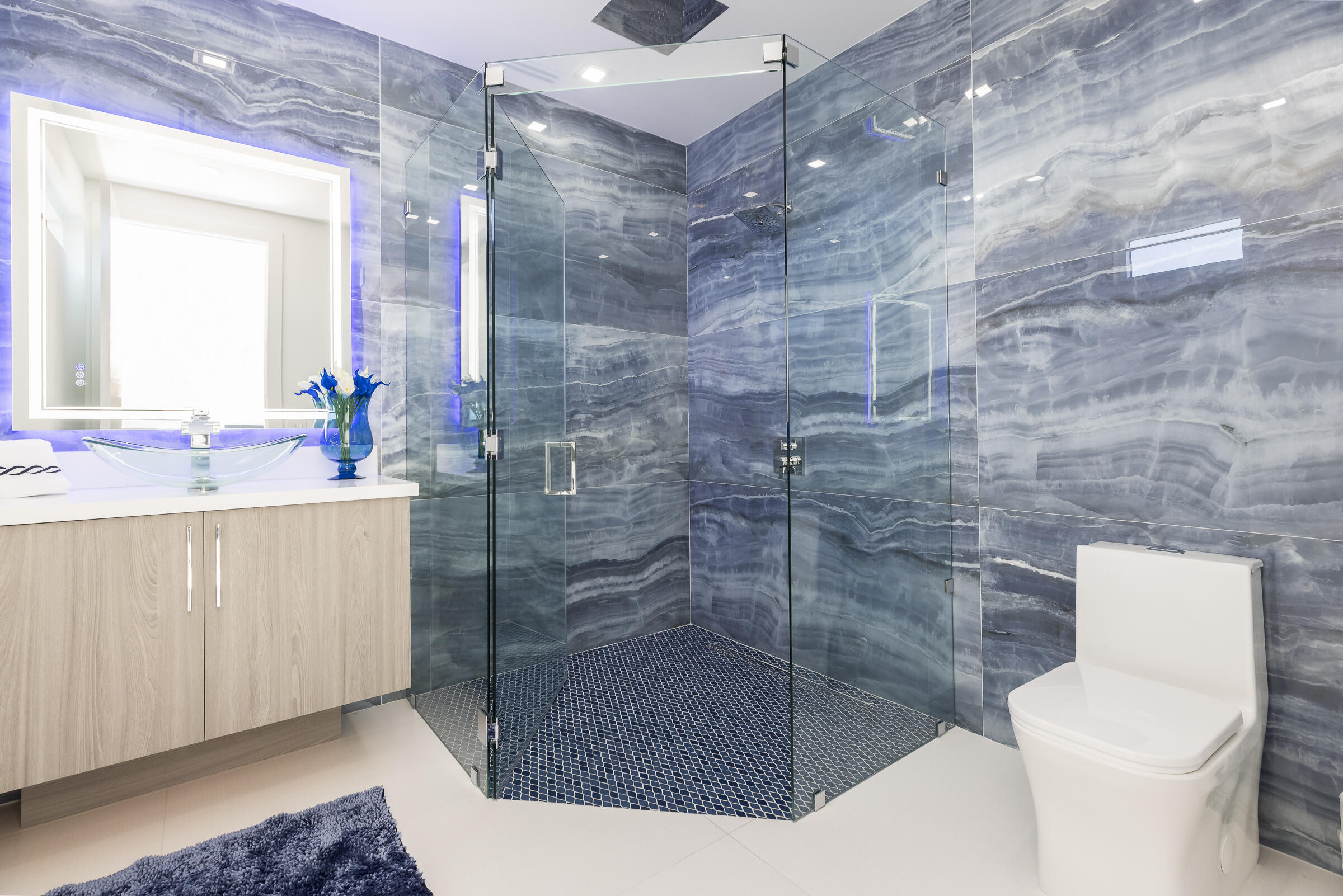 45 Cormorant Drive Key Largo, FL 33037 - Photo 29 of 51 a bathroom with a sink a toilet and shower