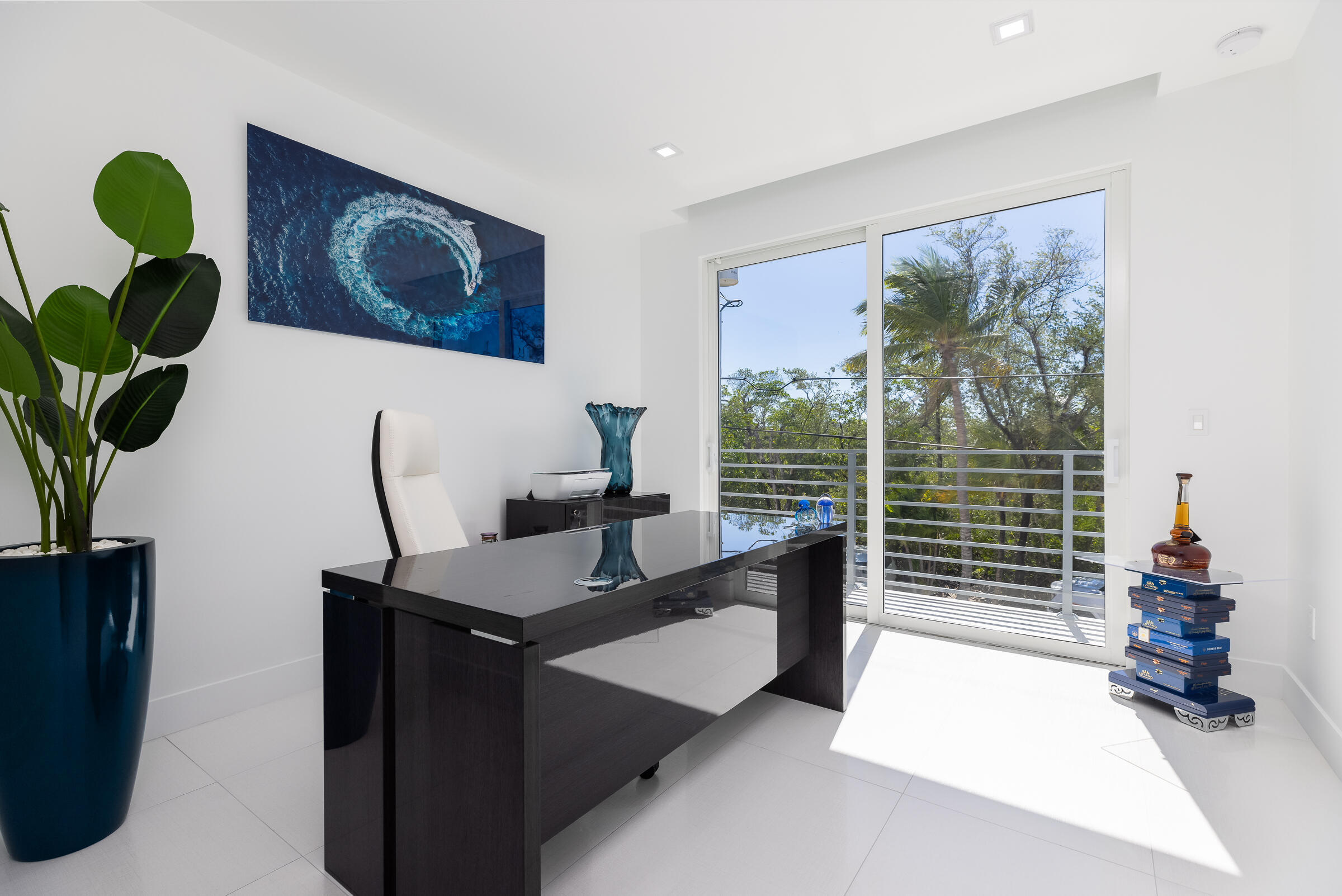 45 Cormorant Drive Key Largo, FL 33037 - Photo 30 of 51 a living room with furniture plant and a window