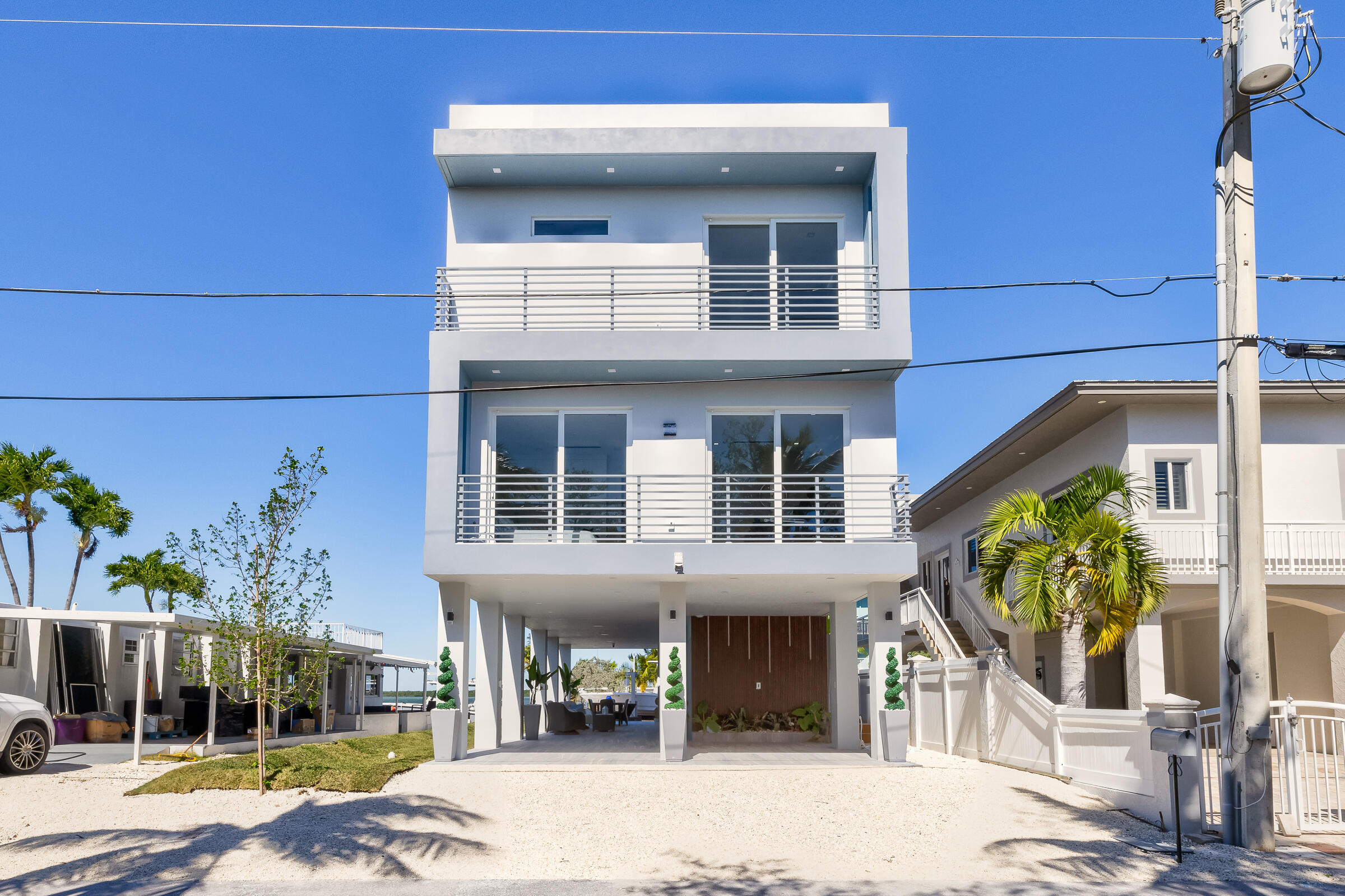 45 Cormorant Drive Key Largo, FL 33037 - Photo 40 of 51 a view of a building with a tree front of house