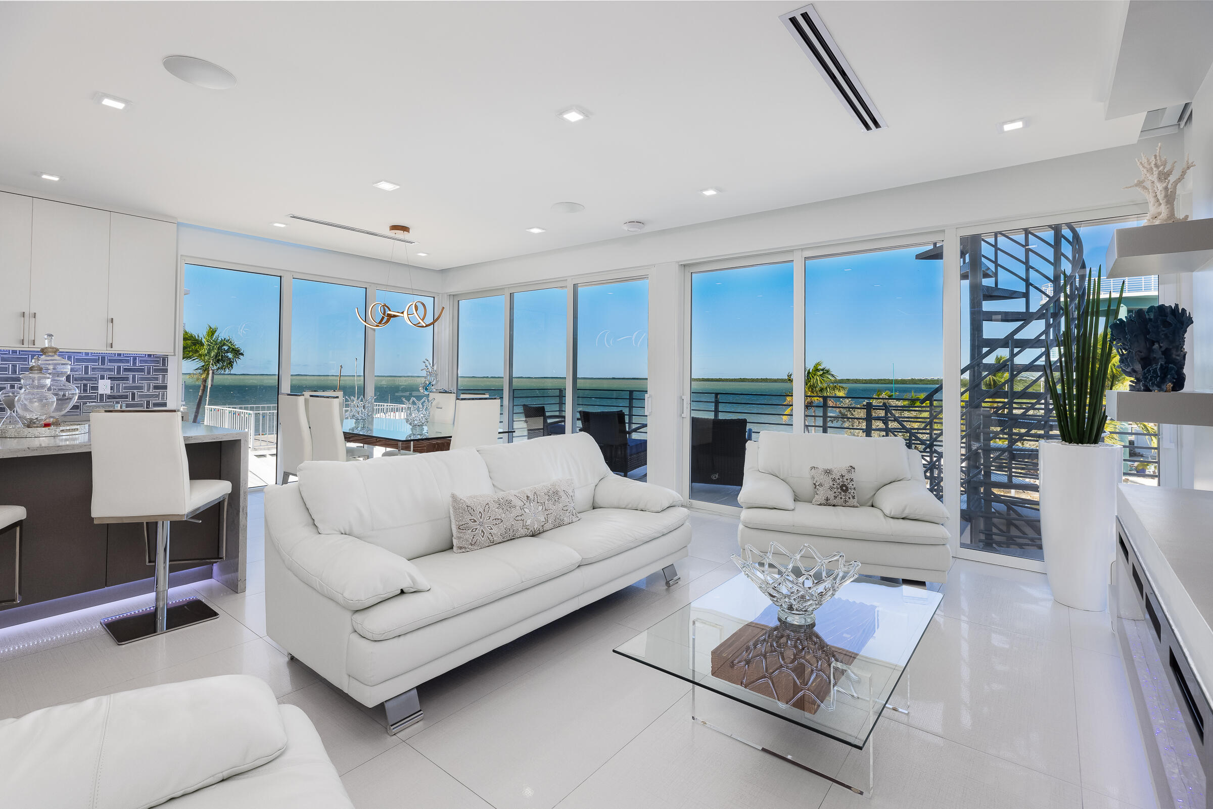 45 Cormorant Drive Key Largo, FL 33037 - Photo 8 of 51 a living room with furniture and a table