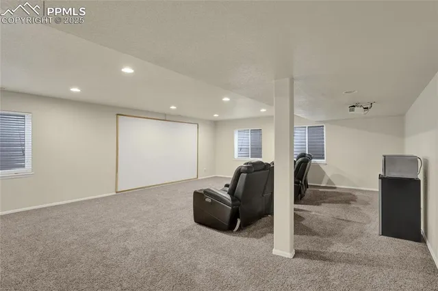 a view of a livingroom with furniture and a couch