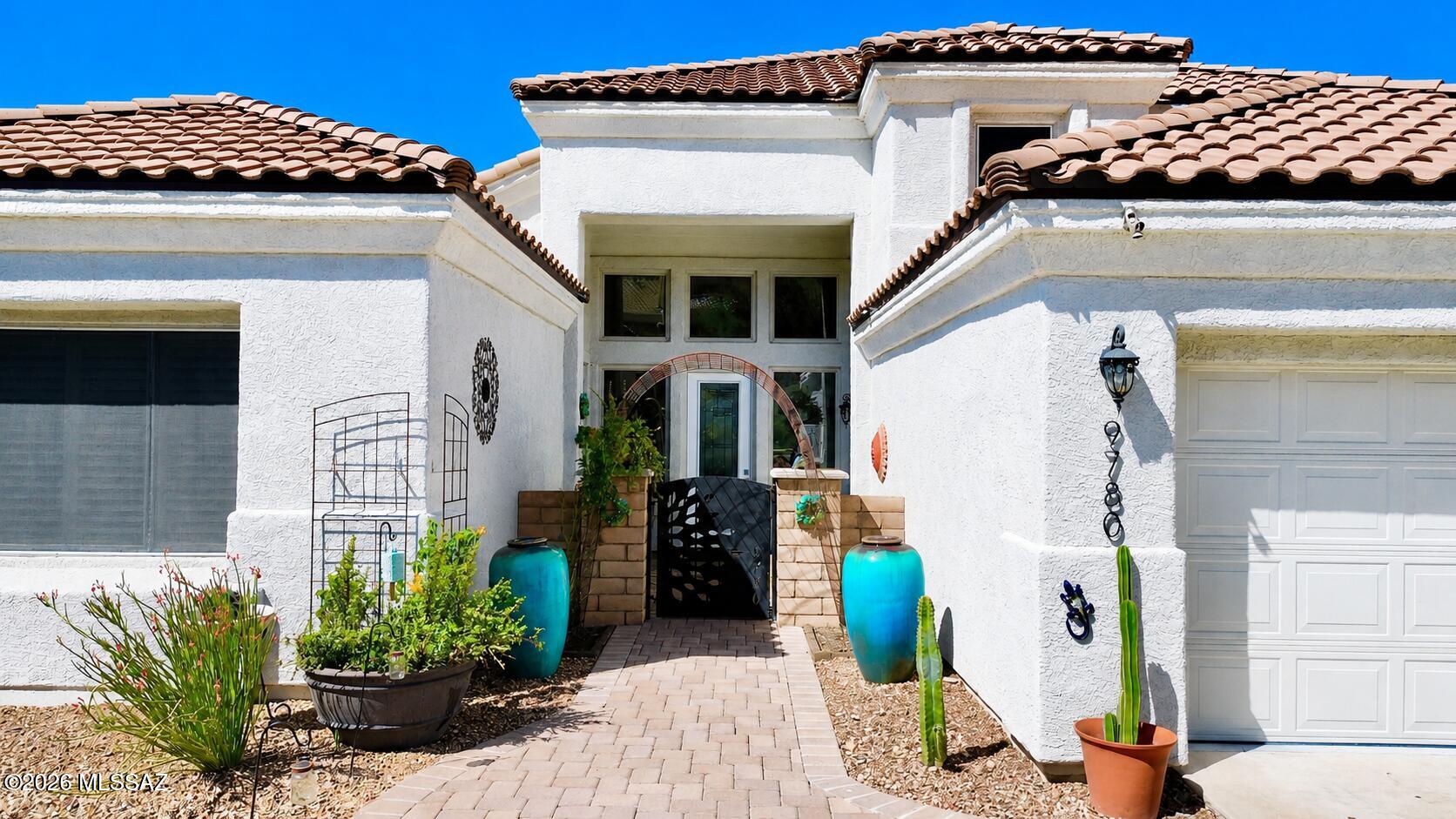 9780 Spring Hill Place Tucson, AZ 85749 - Photo 3 of 49 Front
