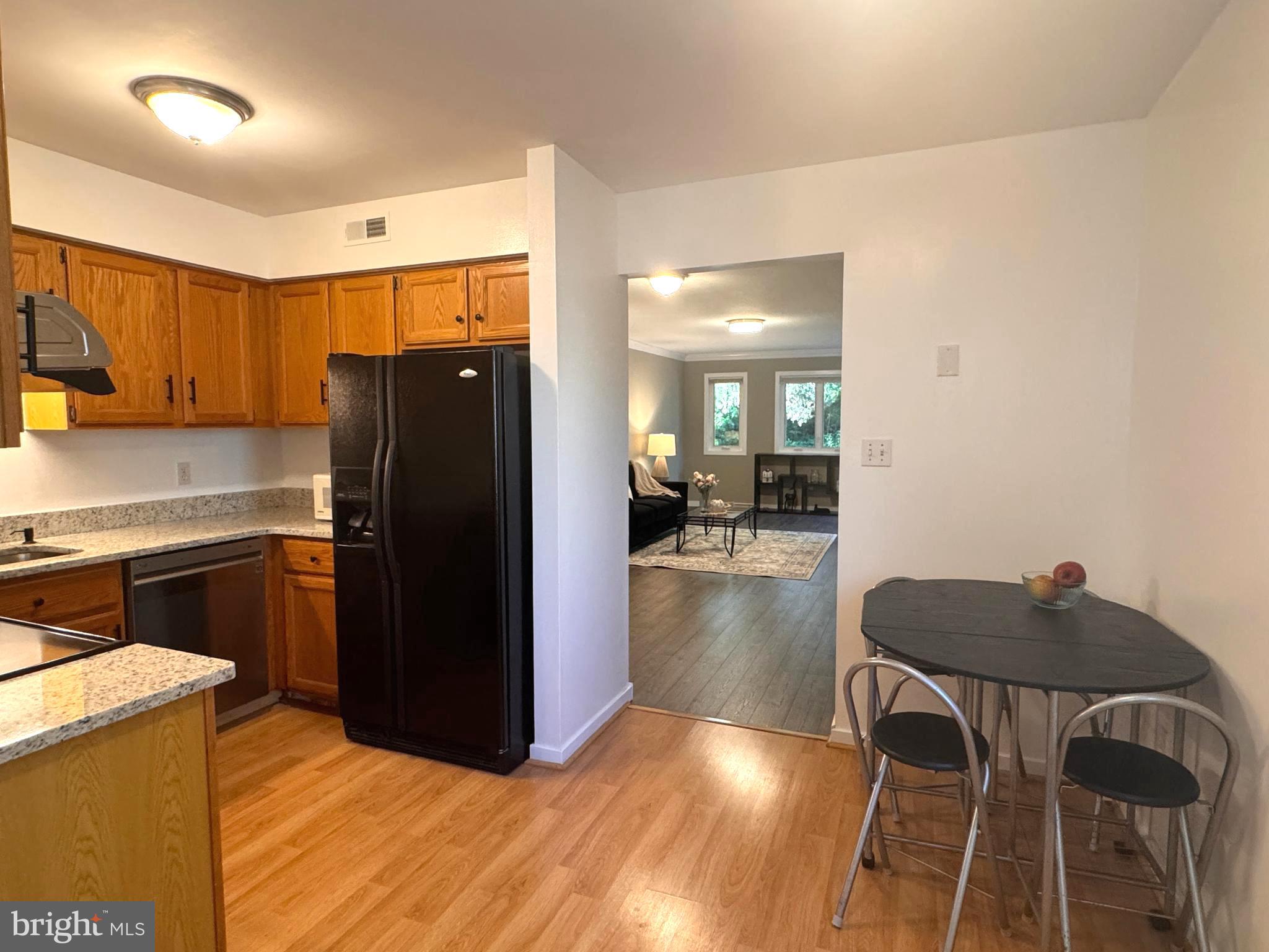 363 Chickory Way Newark, DE 19711 - Photo 12 of 42 a kitchen with stainless steel appliances granite countertop a refrigerator and a stove top oven