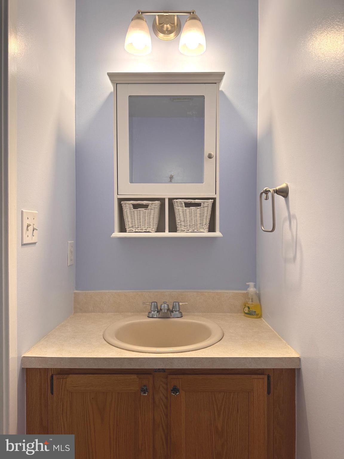363 Chickory Way Newark, DE 19711 - Photo 14 of 42 a bathroom with a sink and a mirror