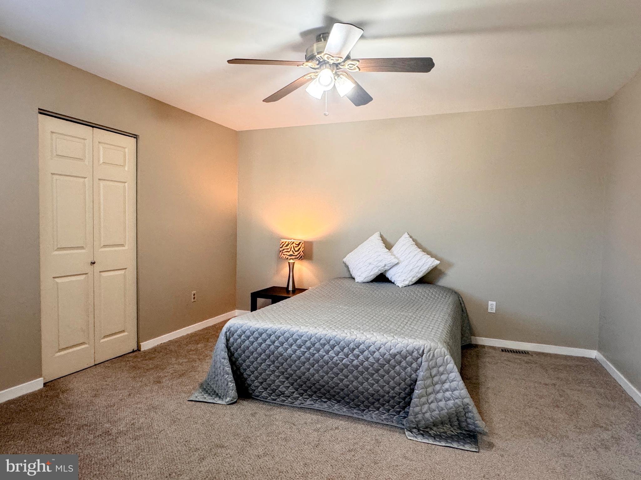 363 Chickory Way Newark, DE 19711 - Photo 18 of 42 a bedroom with a bed and a ceiling fan