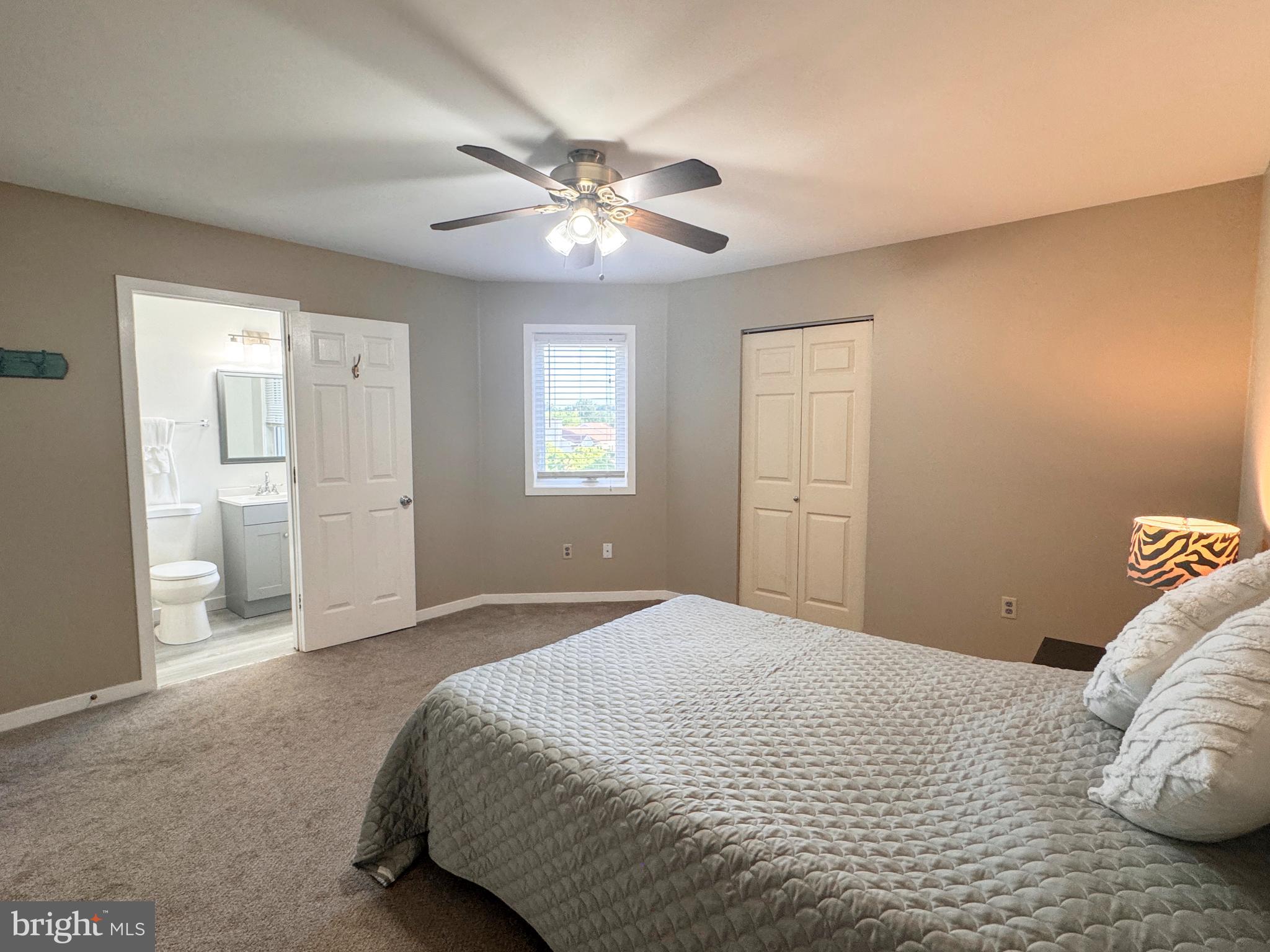 363 Chickory Way Newark, DE 19711 - Photo 19 of 42 a bedroom with a large bed and a chandelier