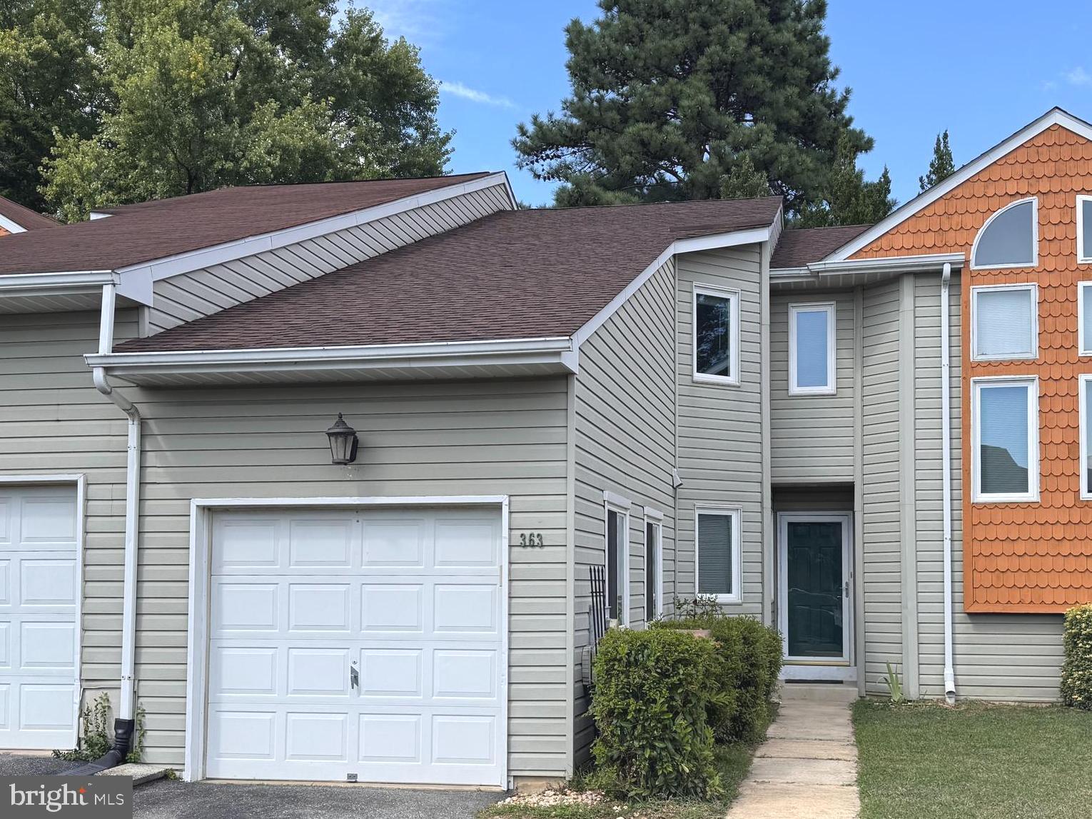 363 Chickory Way Newark, DE 19711 - Photo 2 of 42 a front view of a house with garage
