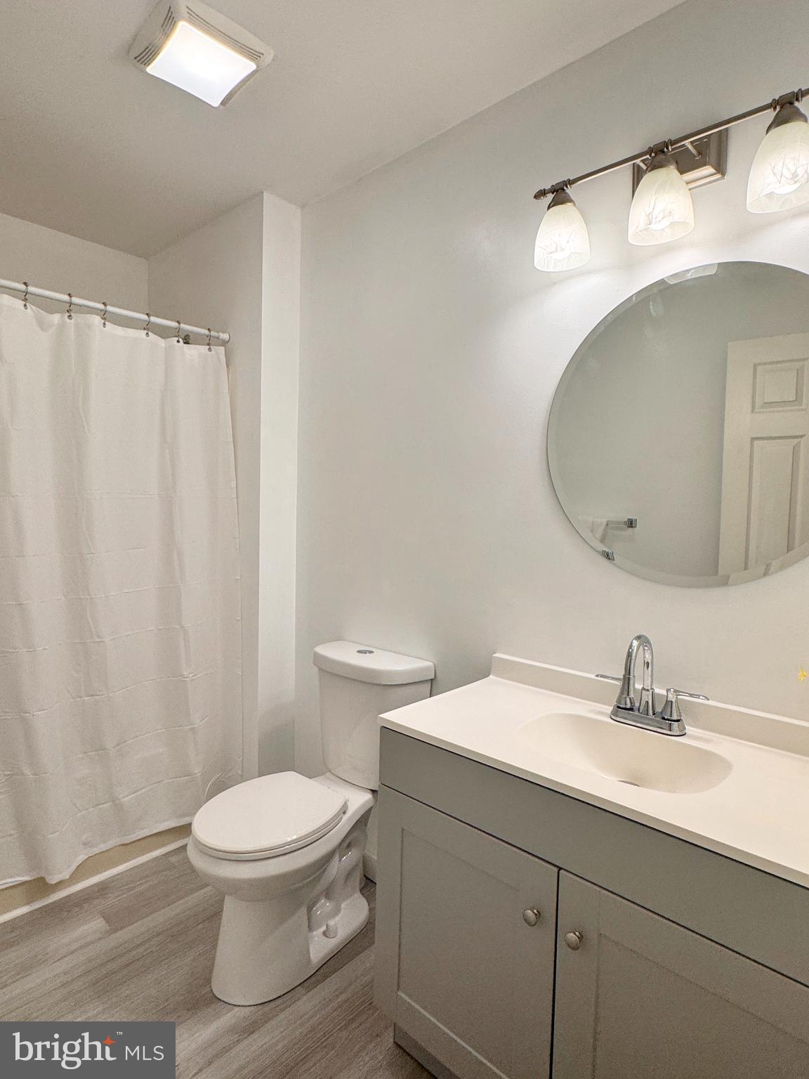 363 Chickory Way Newark, DE 19711 - Photo 31 of 42 a white toilet sitting next to a bathroom sink