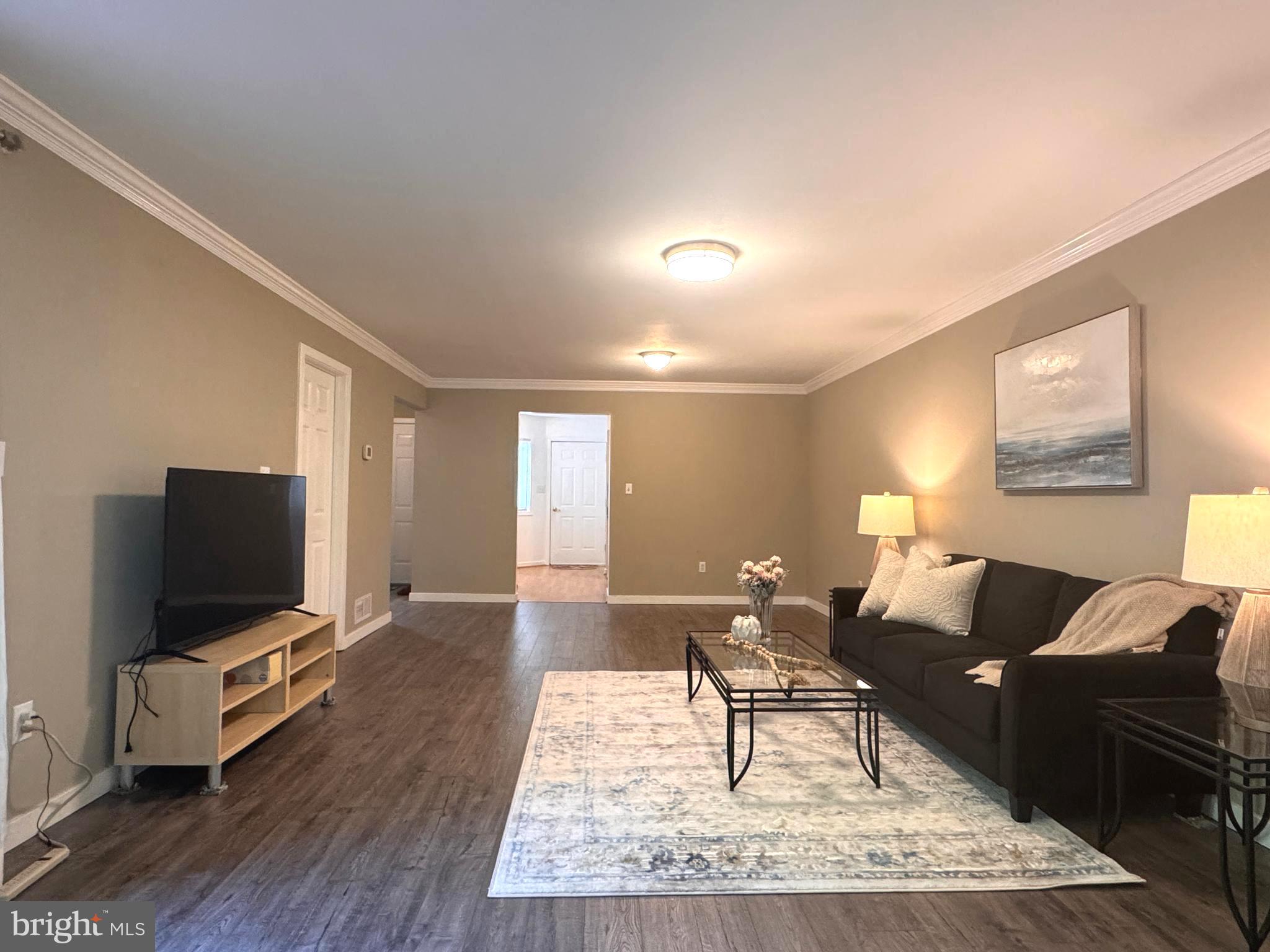 363 Chickory Way Newark, DE 19711 - Photo 6 of 42 a living room with furniture and a flat screen tv