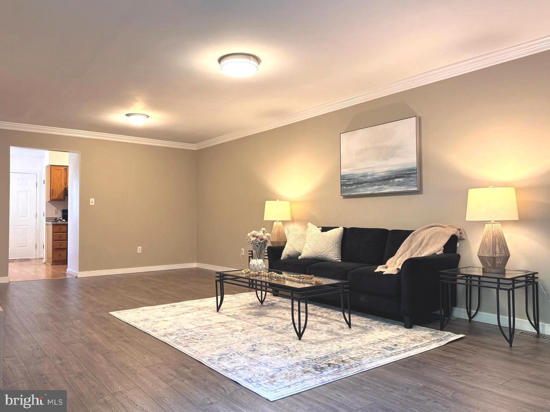 363 Chickory Way Newark, DE 19711 - Photo 7 of 42 a living room with furniture and wooden floor