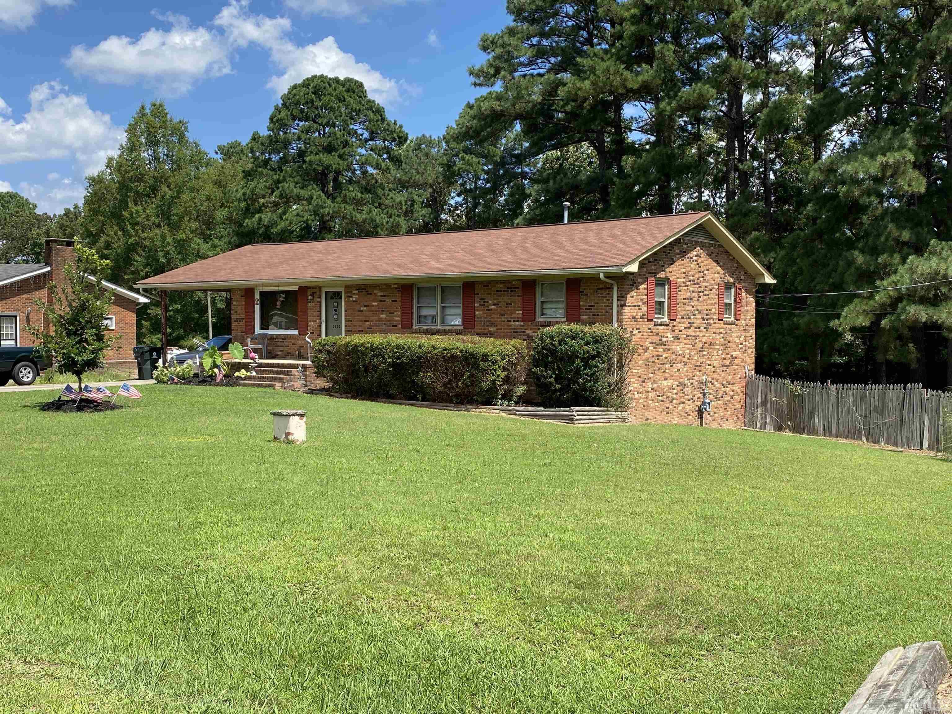2520 Ardsley Drive Durham, NC 27704 - Photo 2 of 28 a front view of a house with garden