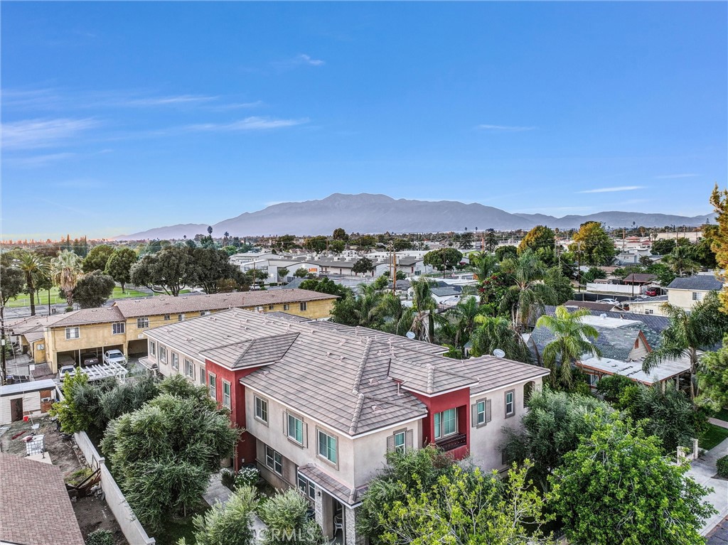 228 North Orange Avenue Rialto, CA 92376 - Photo 24 of 34 an aerial view of residential houses with a city view