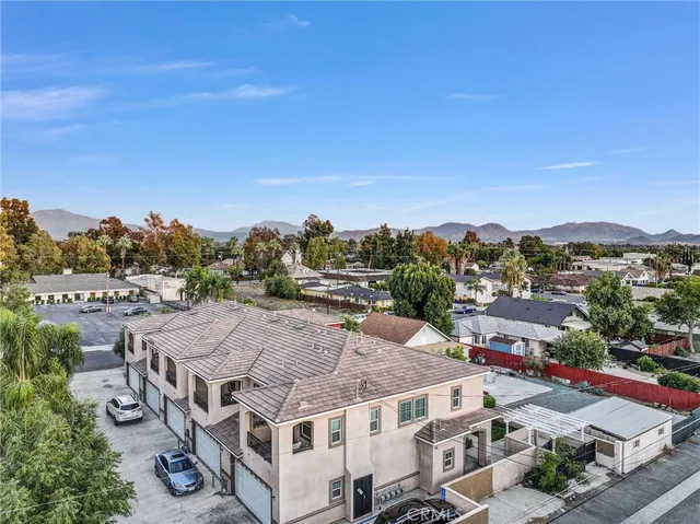 a aerial view of a house with a big yard