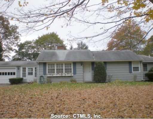 236 Riverdale Road Orange, CT 06477 - Photo 1 of 1 front view of a house with a dry yard
