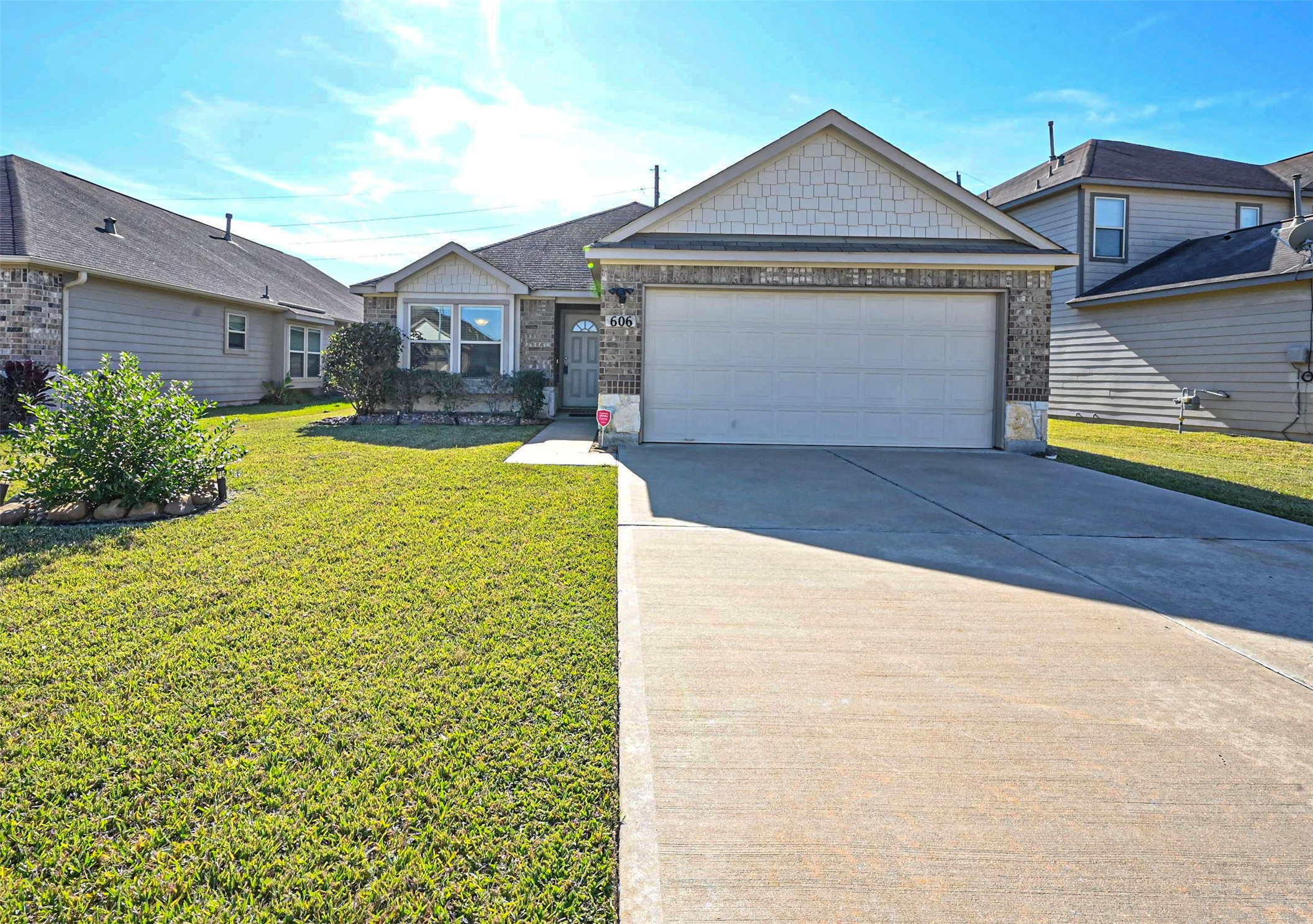 606 Palo ALto Court Rosharon, TX 77583 - Photo 3 of 23 a front view of a house with a yard