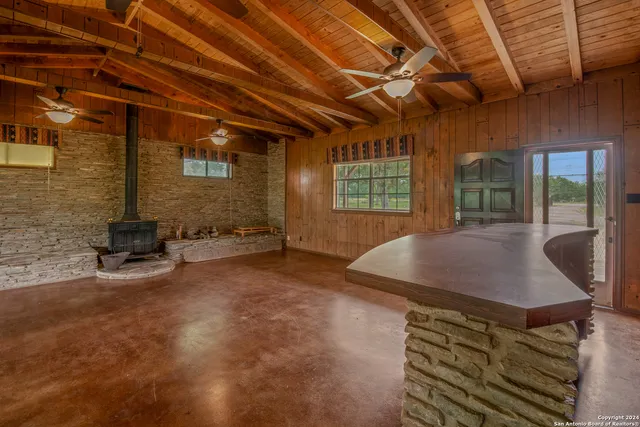 a view of a livingroom with furniture and window