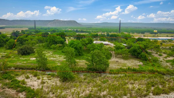 a view of a golf course with a building