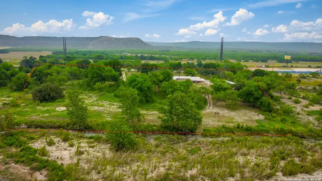 a view of a golf course with a building