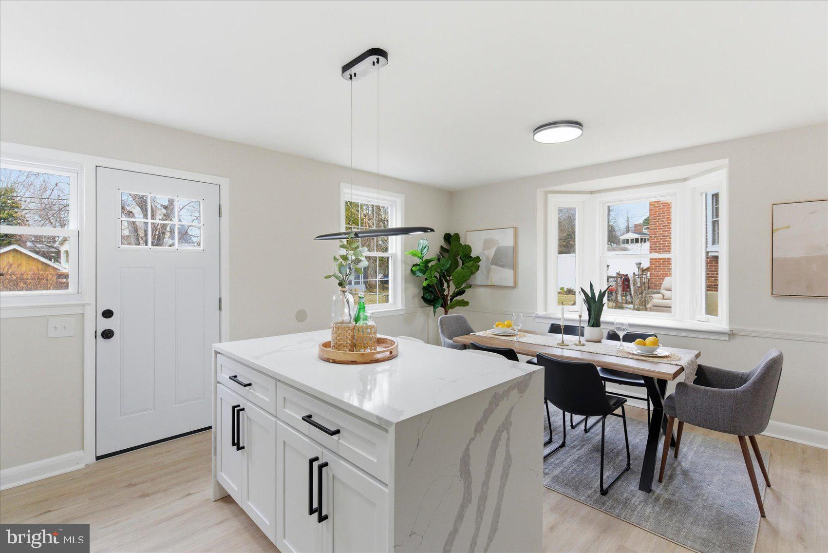 10 Mardrew Road Baltimore, MD 21229 - Photo 15 of 37 a view of a workspace and kitchen