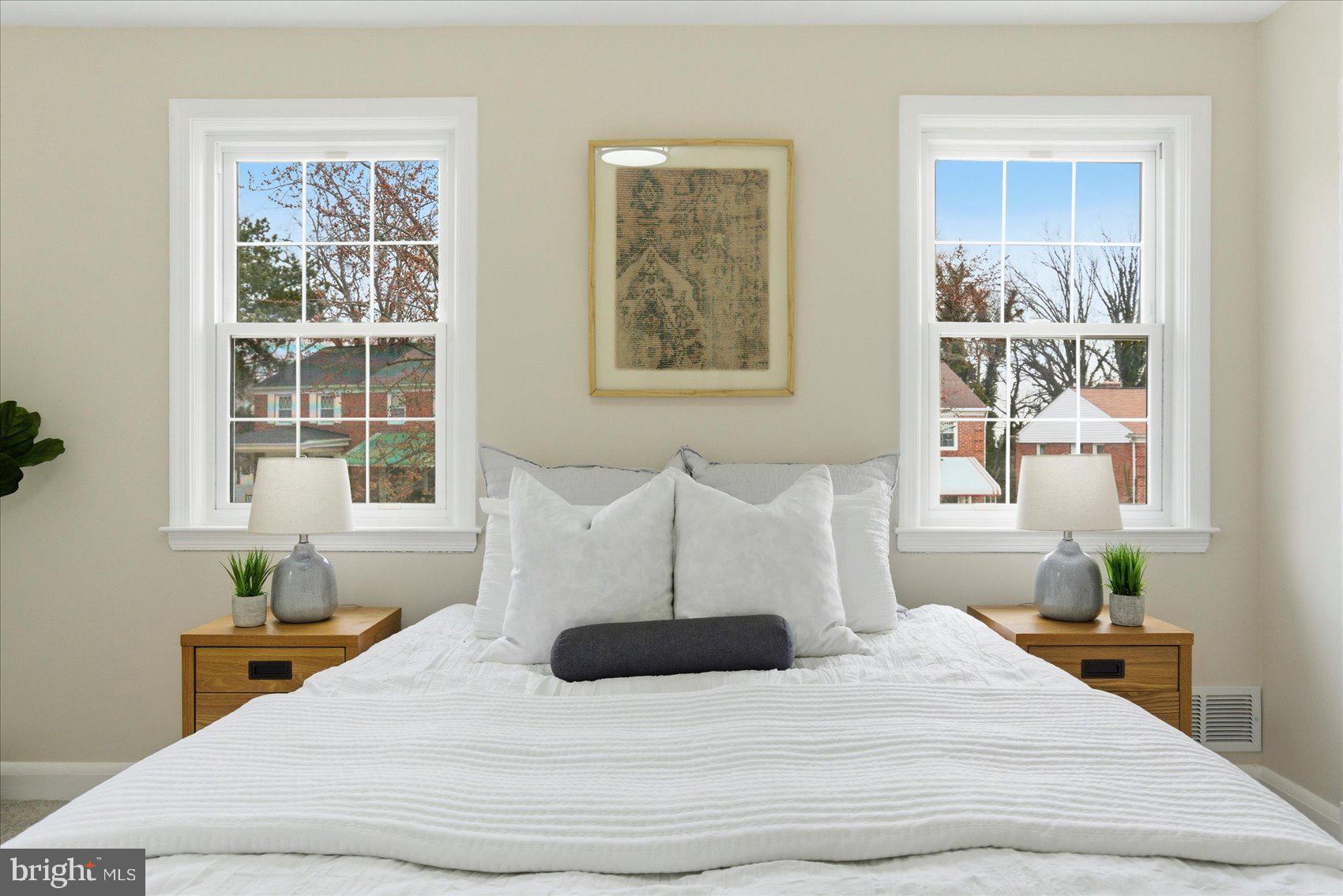 10 Mardrew Road Baltimore, MD 21229 - Photo 19 of 37 a bedroom with a bed and wooden floor