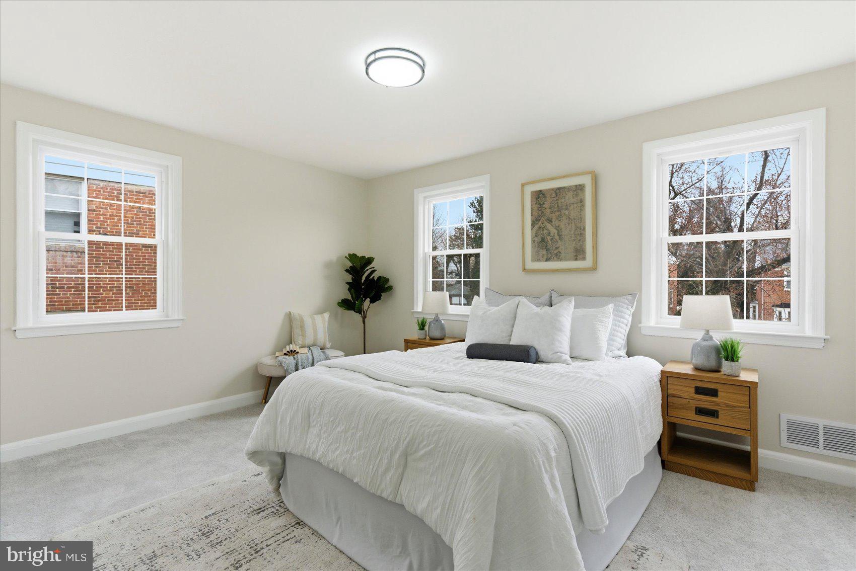 10 Mardrew Road Baltimore, MD 21229 - Photo 20 of 37 a bedroom with a bed and windows