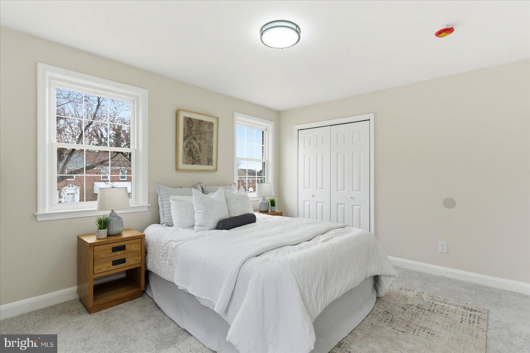 10 Mardrew Road Baltimore, MD 21229 - Photo 21 of 37 a bedroom with a bed and a window