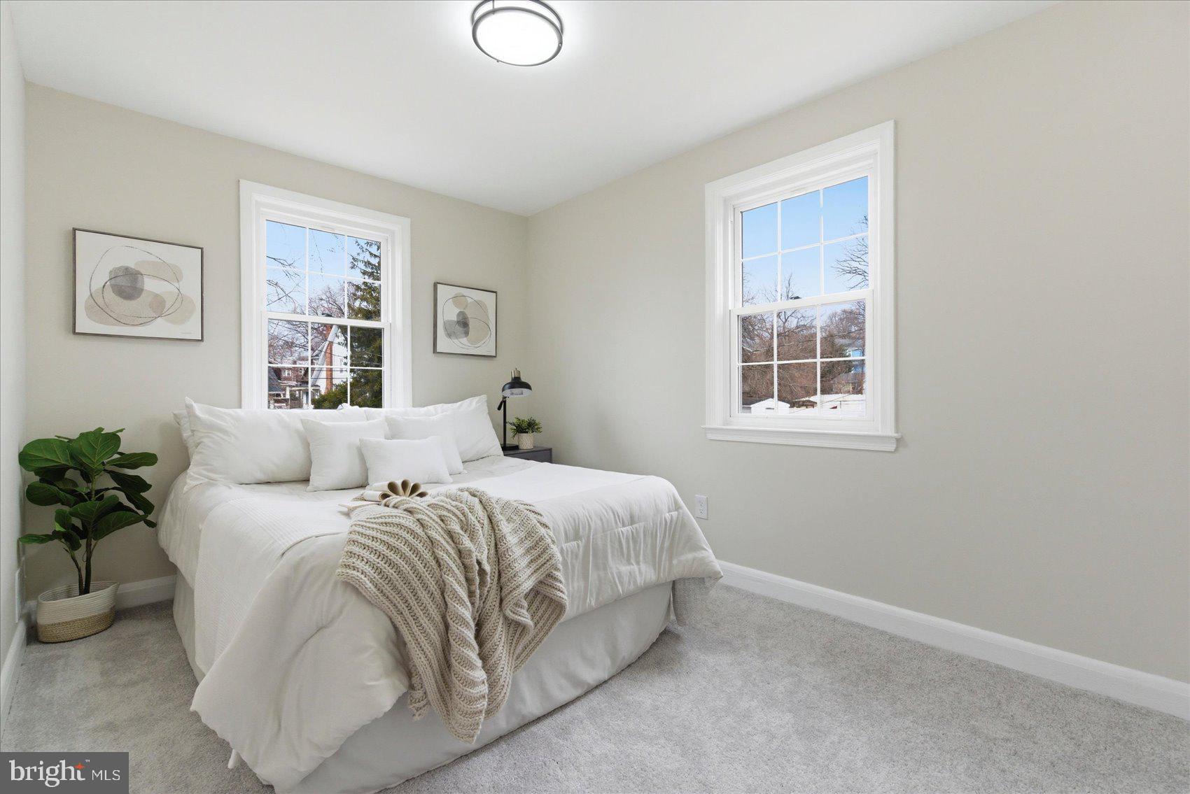 10 Mardrew Road Baltimore, MD 21229 - Photo 22 of 37 a bedroom with a bed and a window