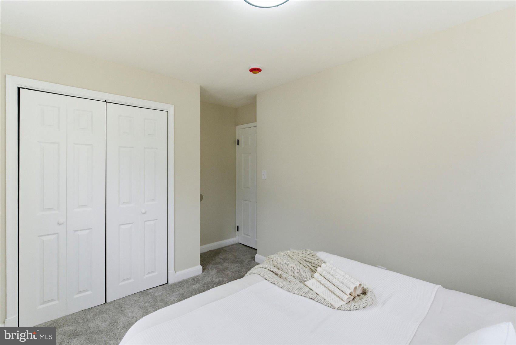 10 Mardrew Road Baltimore, MD 21229 - Photo 25 of 37 a bedroom with a bed and a closet