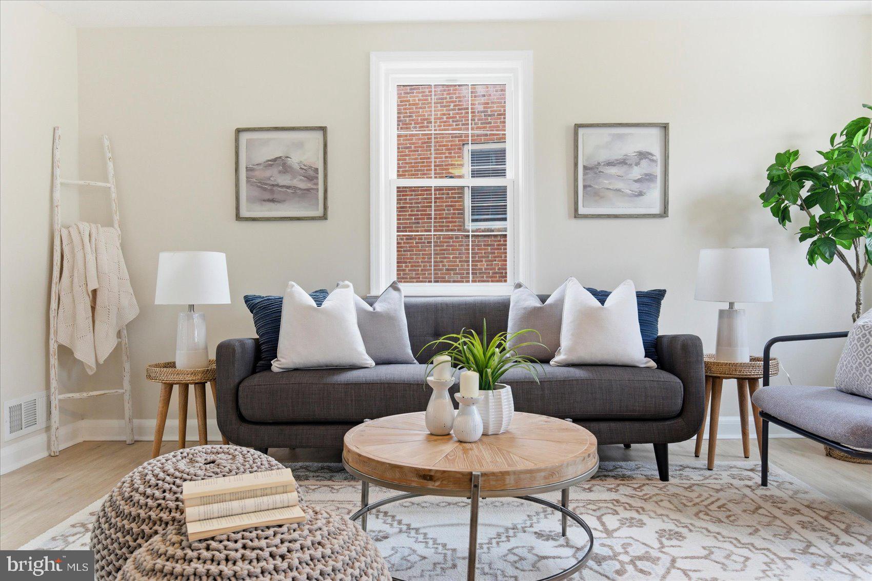 10 Mardrew Road Baltimore, MD 21229 - Photo 4 of 37 a living room with furniture potted plant and window