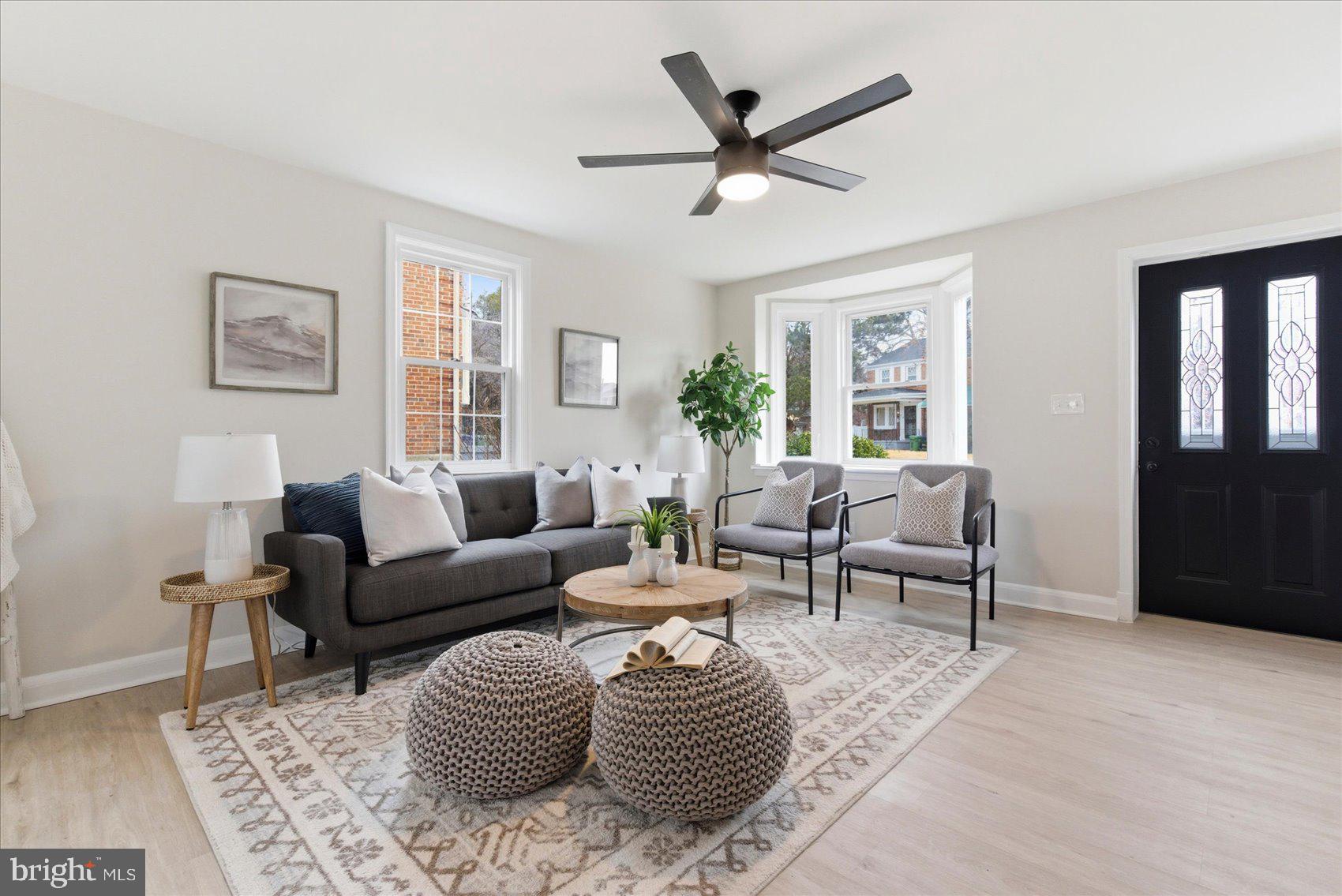 10 Mardrew Road Baltimore, MD 21229 - Photo 5 of 37 a living room with furniture and a large window