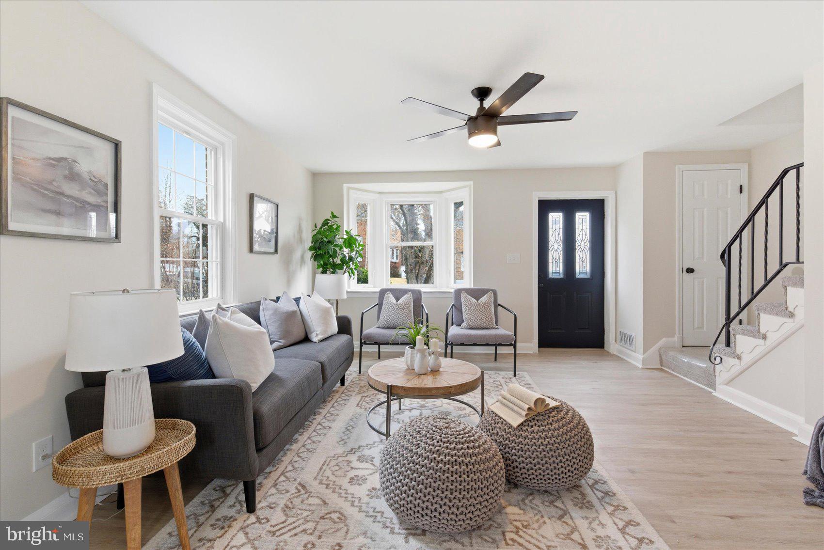 10 Mardrew Road Baltimore, MD 21229 - Photo 7 of 37 a living room with furniture and a wooden floor