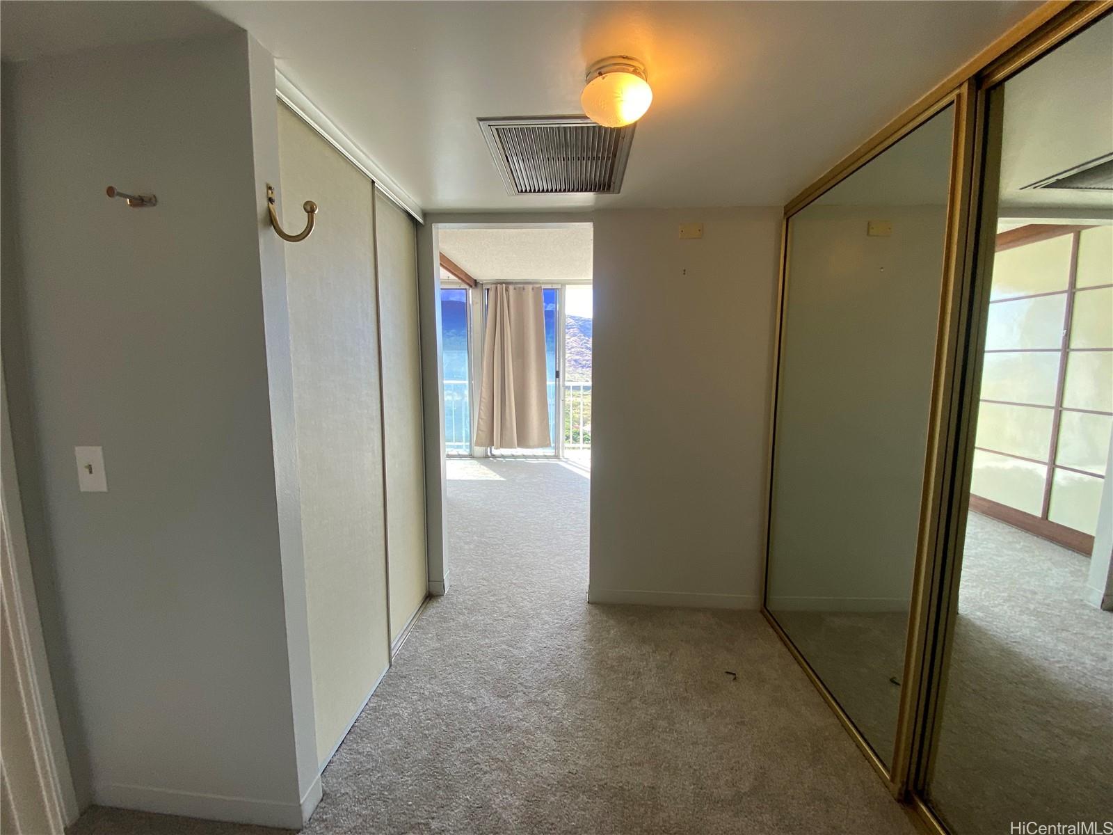 84-710 Kili Drive, Unit 1815 Waianae, HI 96792 - Photo 4 of 7 a view of hallway with furniture and a window