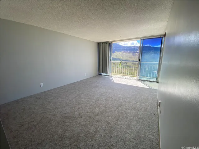 a view of a pool and an outdoor space
