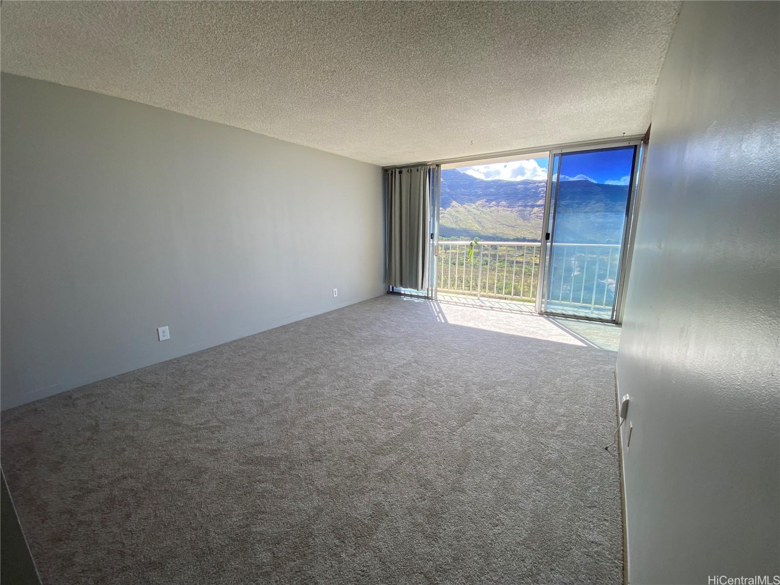 84-710 Kili Drive, Unit 1815 Waianae, HI 96792 - Photo 6 of 7 a view of an empty room with a window