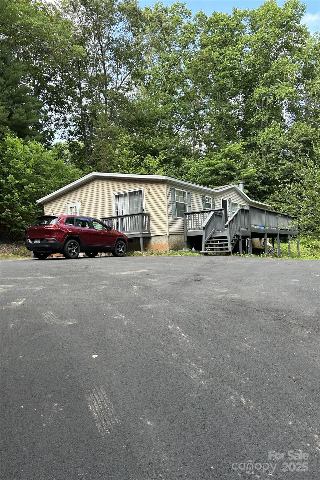 a house with trees in the background