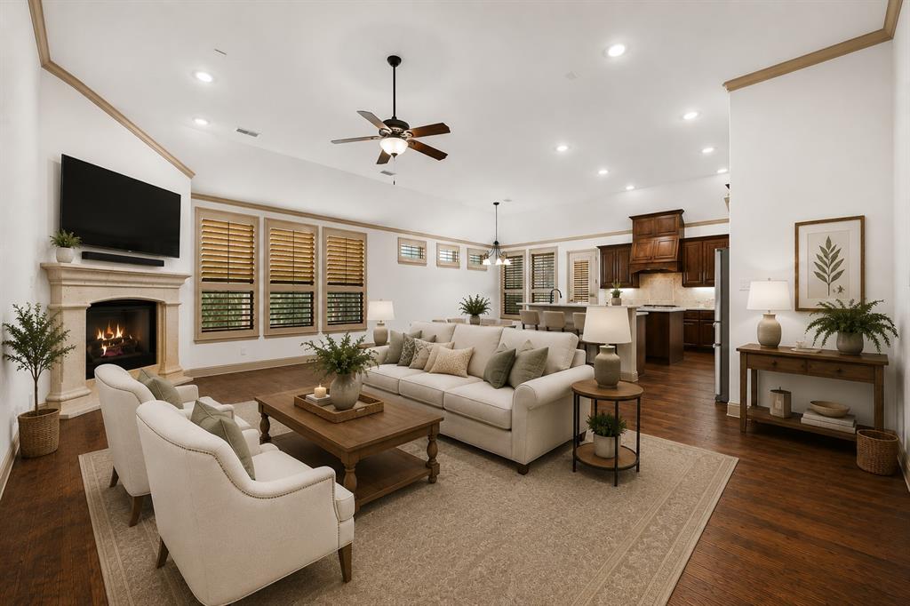 6814 Springwood Lane Garland, TX 75044 - Photo 2 of 35 a living room with fireplace furniture and a flat screen tv