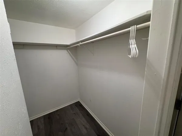 a bathroom with a sink a mirror and shower