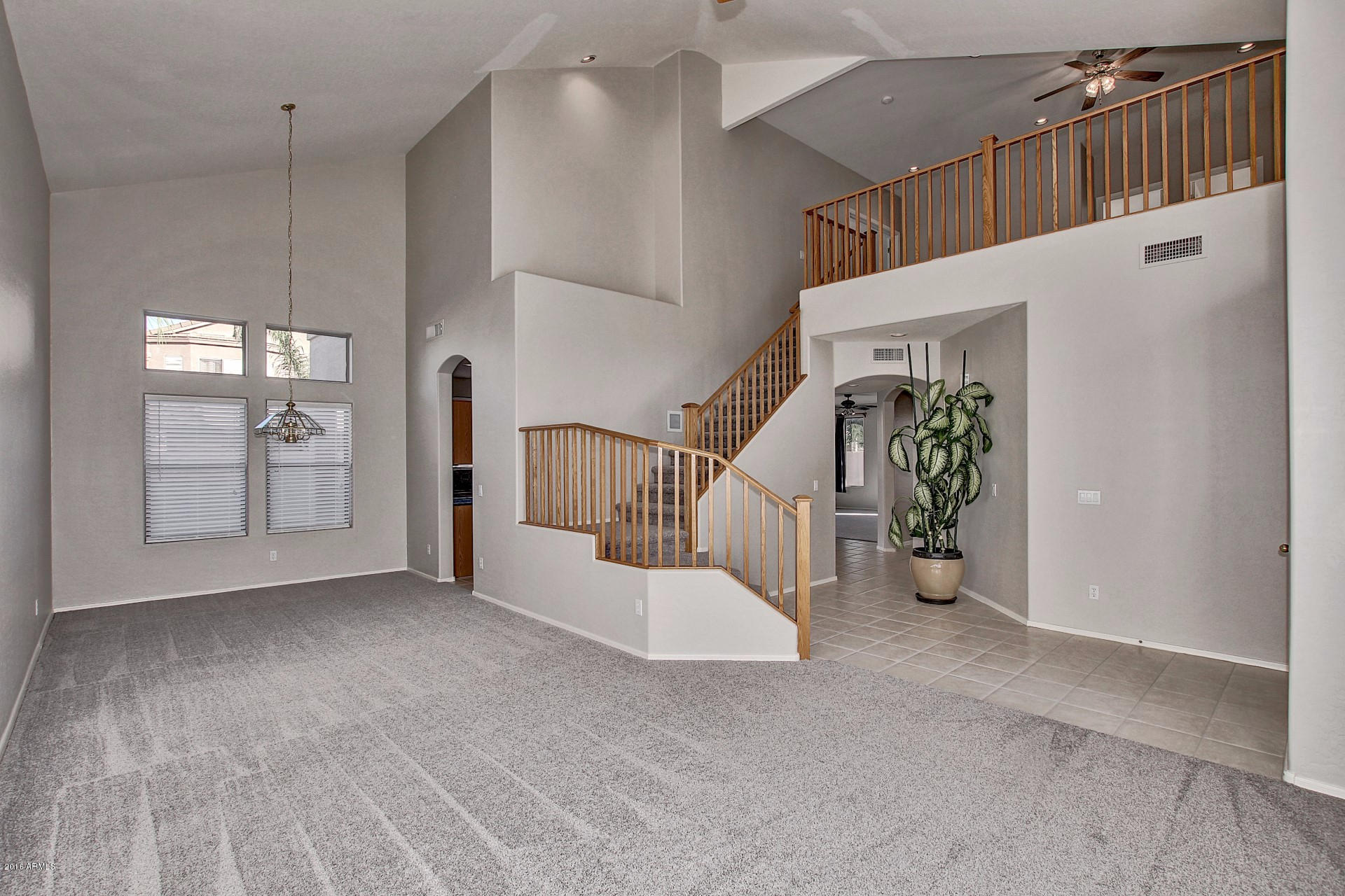 1360 East Harrison Street Gilbert, AZ 85295 - Photo 5 of 34 a view of an entryway with stairs