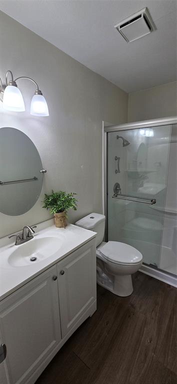 4484 Chaha Road, Unit 103 Garland, TX 75043 - Photo 5 of 13 a bathroom with a sink toilet and shower