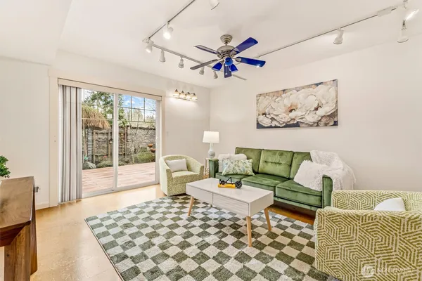 a living room with furniture and a rug