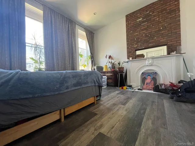 a bed room with a bed and a couch