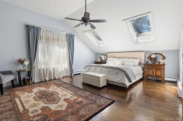 a bathroom with a tub and shower