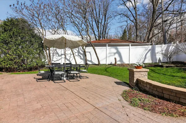 a view of a swimming pool and an outdoor space