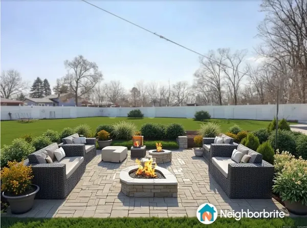 a view of a backyard with sitting area and outdoor kitchen